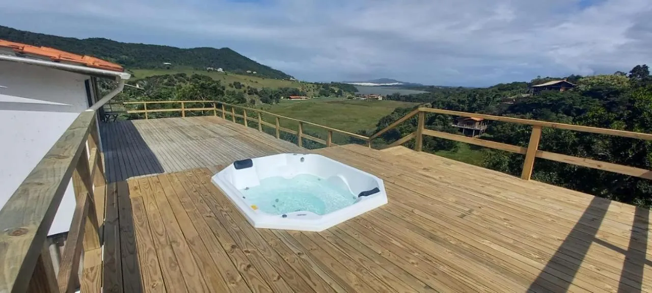 Villa Santorini Praia do Rosa com piscina e jacuzzi Brasile