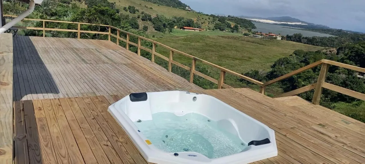 Villa Santorini Praia do Rosa com piscina e jacuzzi