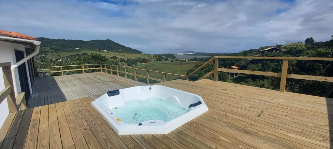 Villa Santorini Praia do Rosa com piscina e jacuzzi