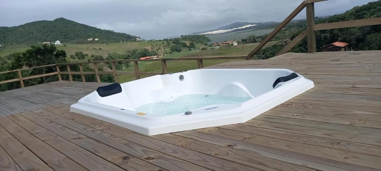 Villa Santorini Praia do Rosa com piscina e jacuzzi