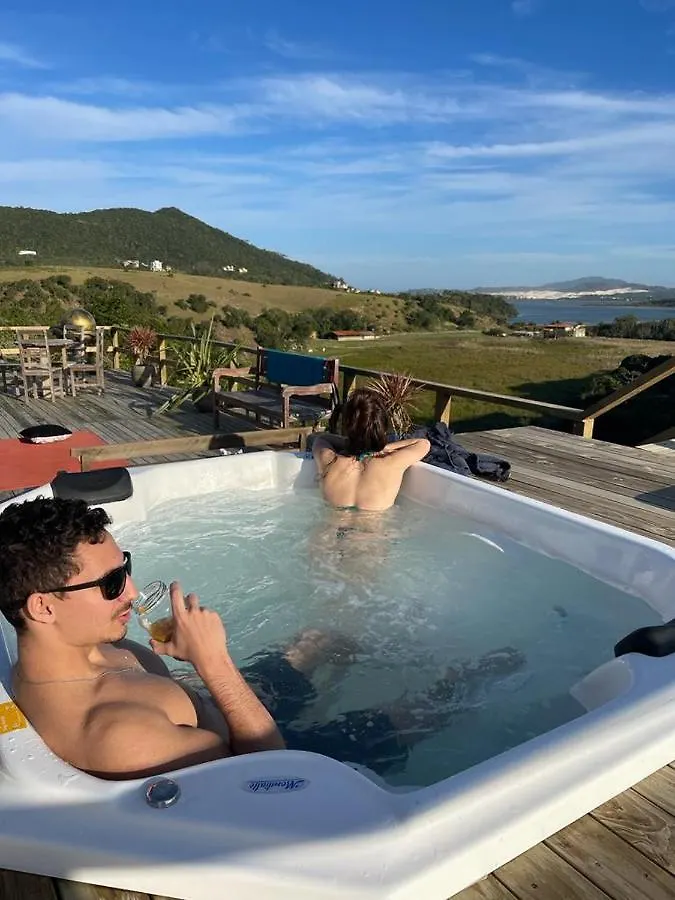 Villa Santorini Praia do Rosa com piscina e jacuzzi 0*,  Brasile